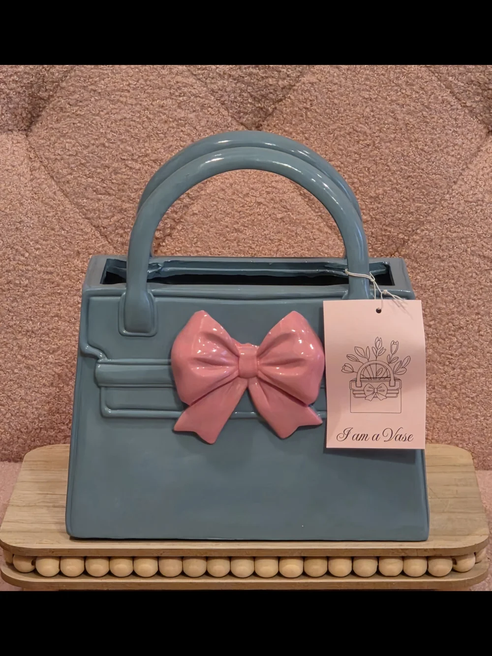 Blue Handbag with Pink Bow Accent Vase